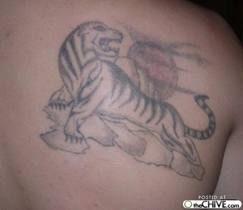 Horrible Grey Ink Tiger Tattoo On Back Shoulder