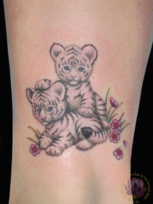 Grey Ink Baby Tigers Tattoos On Leg