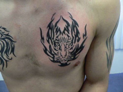 Awesome Tribal Tiger Head Tattoo On Chest
