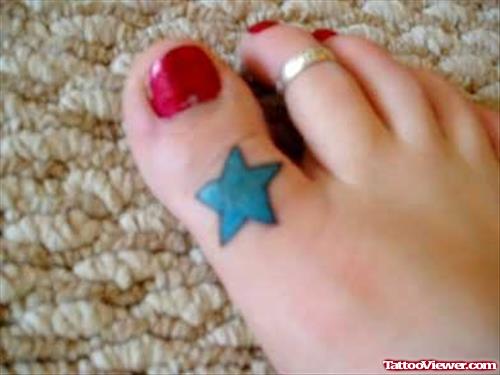 Blue Star Tattoo On Toe