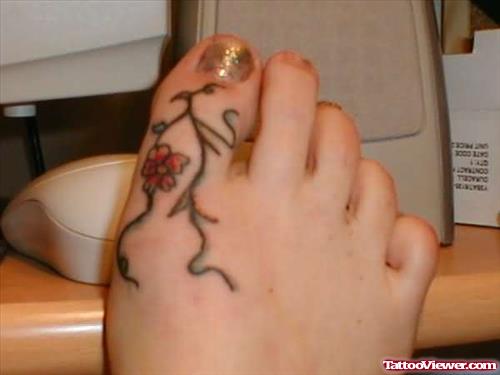 Flower Branch Tattoo On Toe