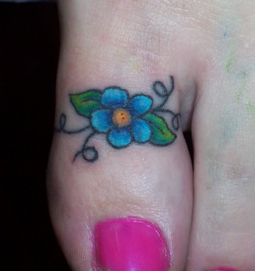 Beautiful Flower Tattoo On Toe