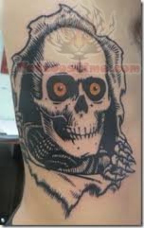 Skull Ripped Skin Tattoo