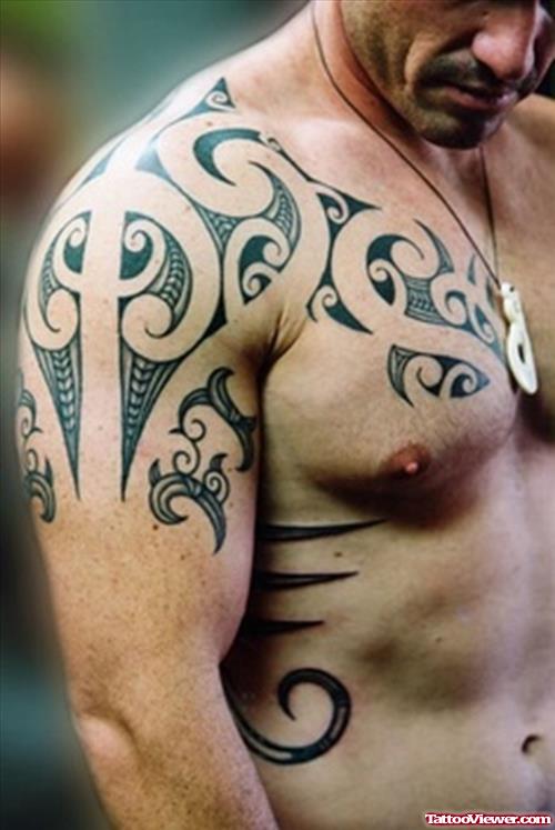 Tribal Shoulder and Chest Tattoo For Men