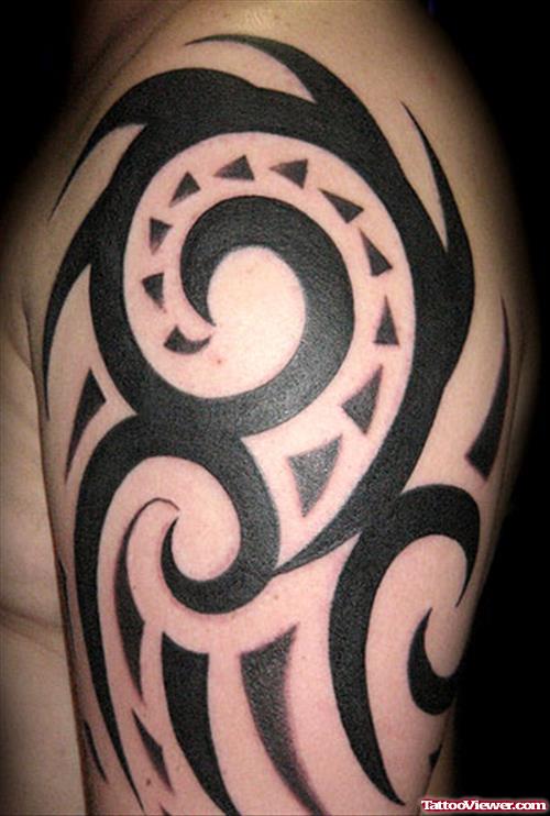Black Ink Tribal Tattoo On Half Sleeve