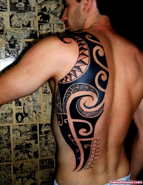 Black Ink Maori Tribal Tattoo On Back