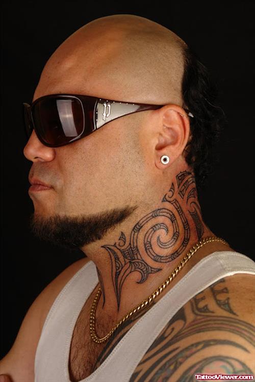 Tribal Tattoo On Neck And Left Shoulder