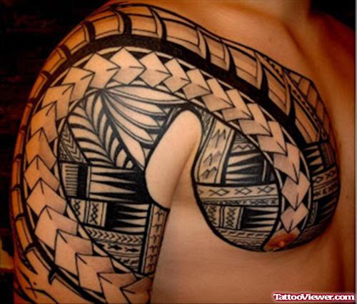 Black Ink Maori Tribal Tattoo On Chest And Right Half Sleeve