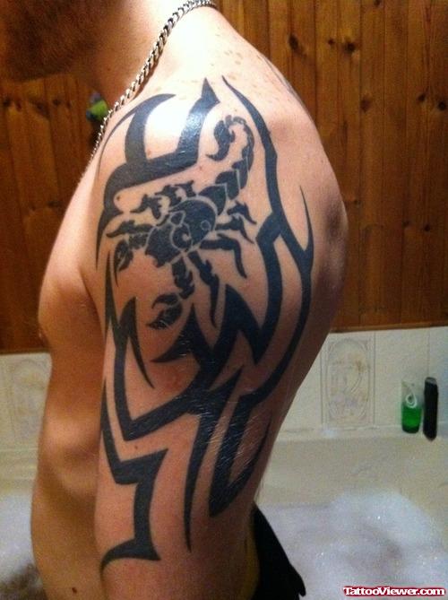 Amazing Left Half Sleeve Tribal Tattoo For Men