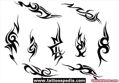 Amazing Black Ink Tribal Tattoos Designs For Men