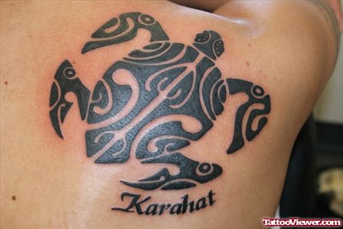Black Ink Tribal Turtle Tattoo On Back Shoulder