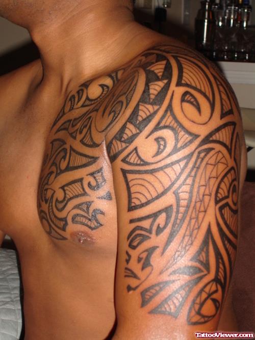 Awesome Left Half Sleeve Tribal Tattoo For Men