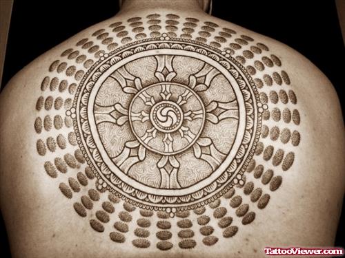 Tribal Holy Ring Tattoo On Upperback
