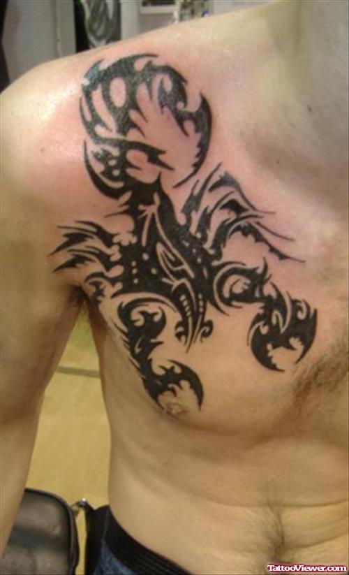 Tribal Scorpion Tattoo On Man Chest