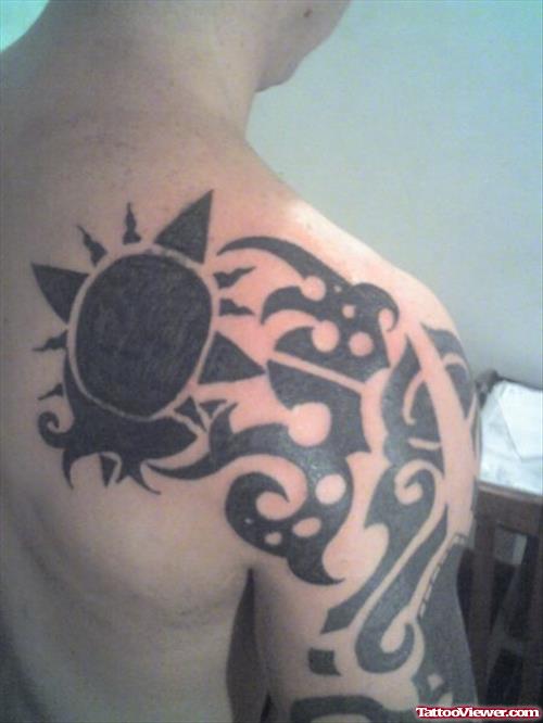 Black Ink Sun and Tribal Tattoo On Right Sleeve