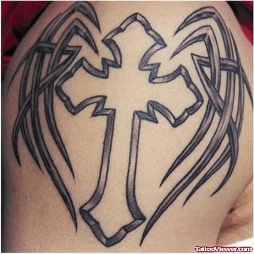 Tribal Winged Cross Tattoo On Left Shoulder