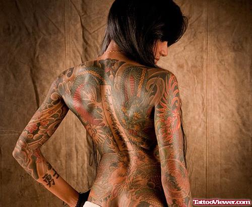 Girl With Tribal Tattoo On Full Back