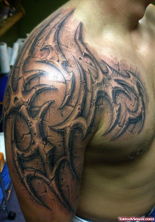 Grey Ink 3D Tribal Tattoo On Bicep And Chest
