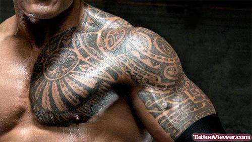 Cool Tribal Tattoo On Chest And Left Half Sleeve