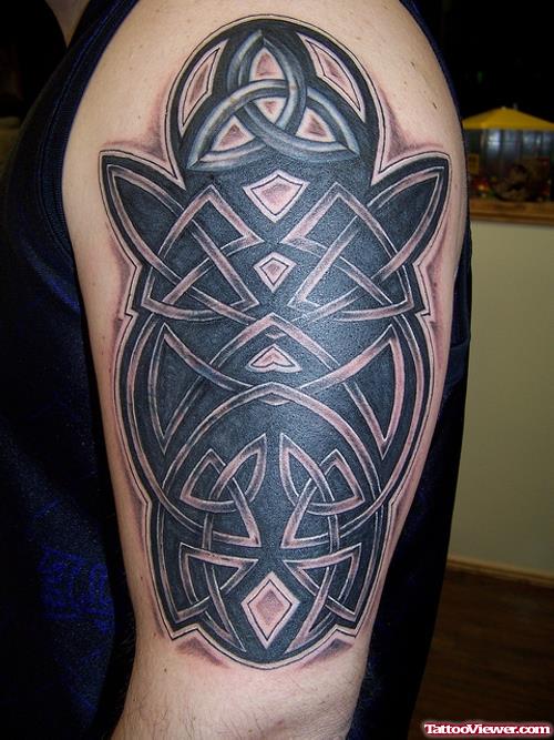 Attractive Left Half Sleeve Tribal Tattoo