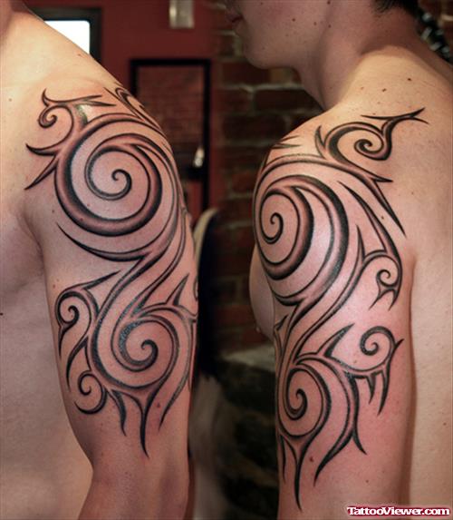 Attractive Grey Ink Tribal Tattoo On Half Sleeve