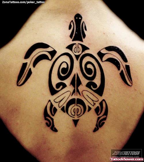 Black Ink Tribal Turtle Tattoo On Back