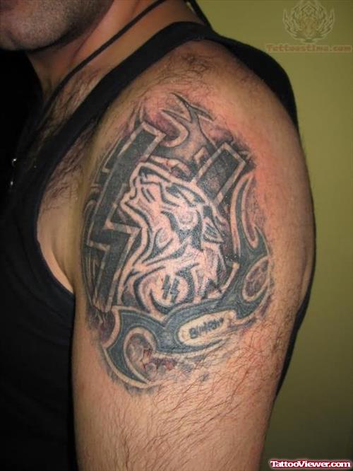 Grey Ink Tribal Tattoo On Left Shoulder