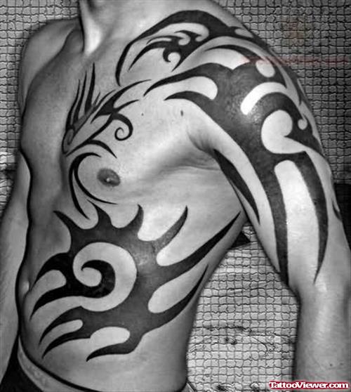 Tribal Tattoo On Shoulder And Rib Side