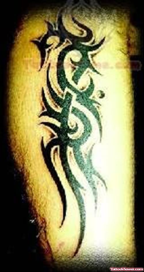 Shining Black Tribal Tattoo Picture