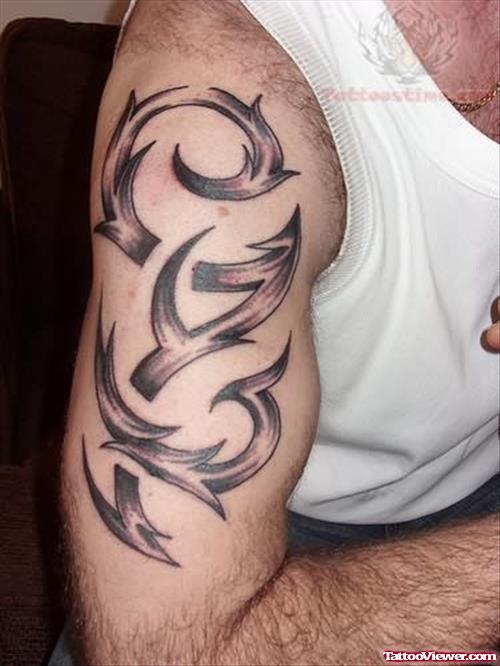 Tribal Tattoo On Muscles For Men