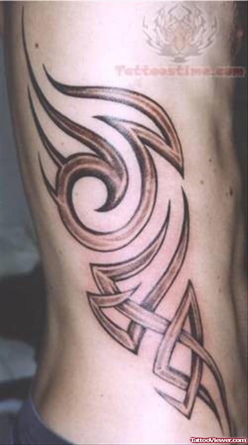 Quaint Tribal Tattoo On Rib