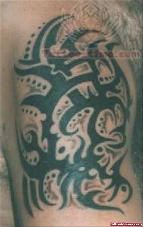 Nice Green Tribal Tattoo