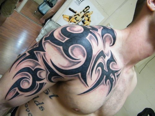 Amazing Black Ink Tribal Tattoo On Right Half Sleeve