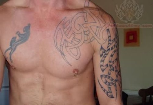 Tribal Tattoo On Chest And Half Sleeve