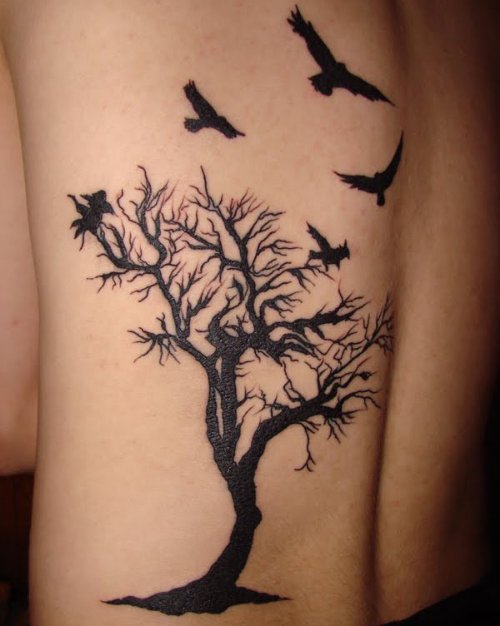 Tribal Black Tree And Birds Tattoo On Left Bicep