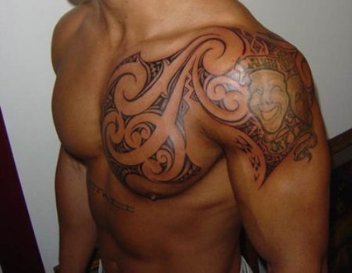 Amazing Tribal Tattoo On Man Chest And Left Shoulder