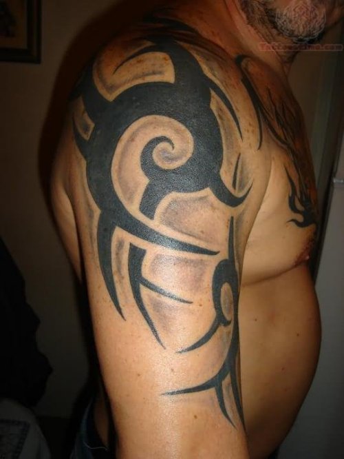 Tribal Tattoo On Men Half Sleeve