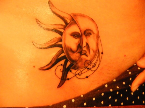 Tribal Sun Tattoo On Lowerback