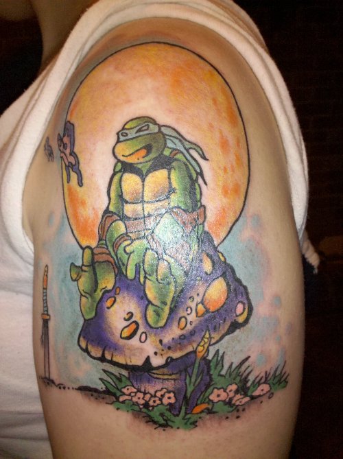 Turtle Sitting On Mushroom Tattoo On Bicep