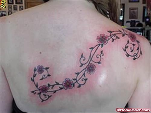 Vine And Cherry Blossom Tattoo