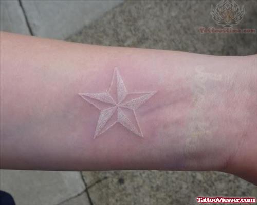 White Ink Star Tattoo On Wrist