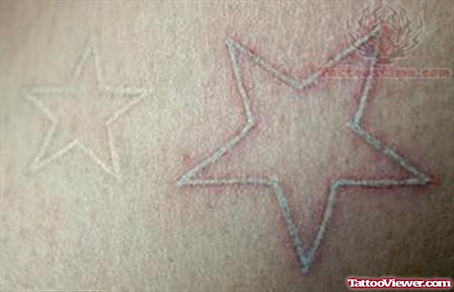 Starry White Ink Tattoo