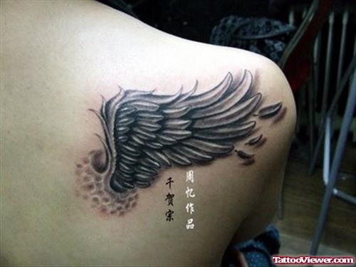Grey Ink Angel Wing Tattoo On Right Back Shoulder