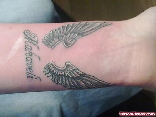 Awesome Grey Ink Angel Wings Tattoos On Wrist