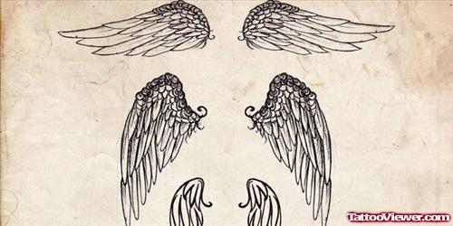 Latest Grey Ink Wings Tattoos Designs