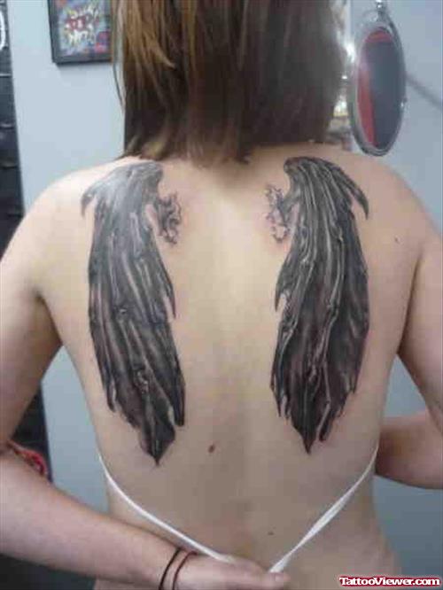 Wings Tattoo On Girl Back Body