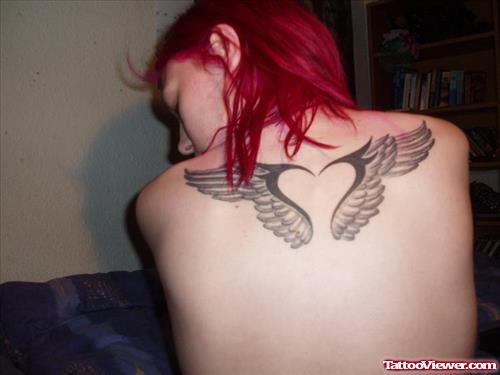 Grey Ink Wings Heart Tattoo On Upperback