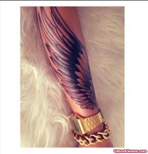 Dark Ink Angel Wing Tattoo On Arm