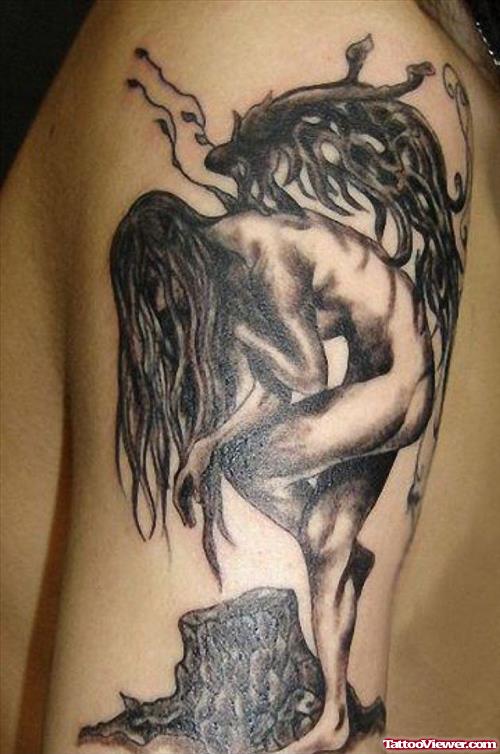 Grey Ink Wings Tattoo On Left Sleeve