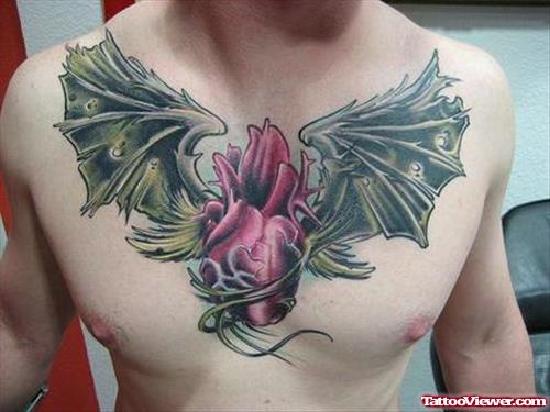 Devil Winged Heart Tattoo On Man Chest
